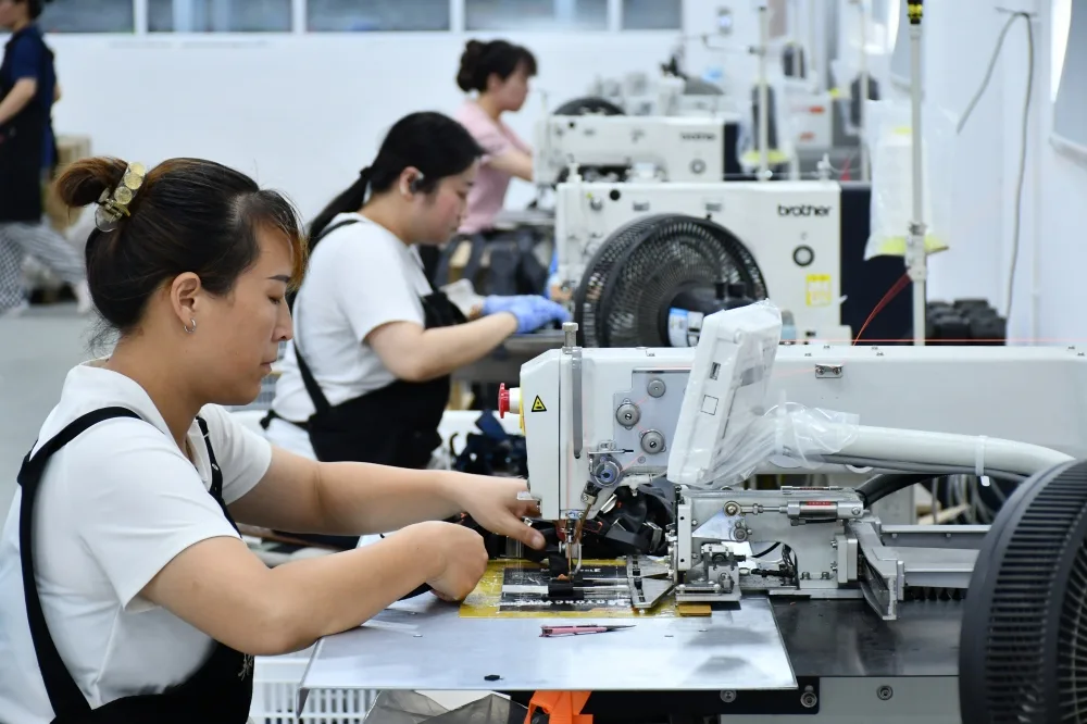 Pioneers Gears team on the workshop floor